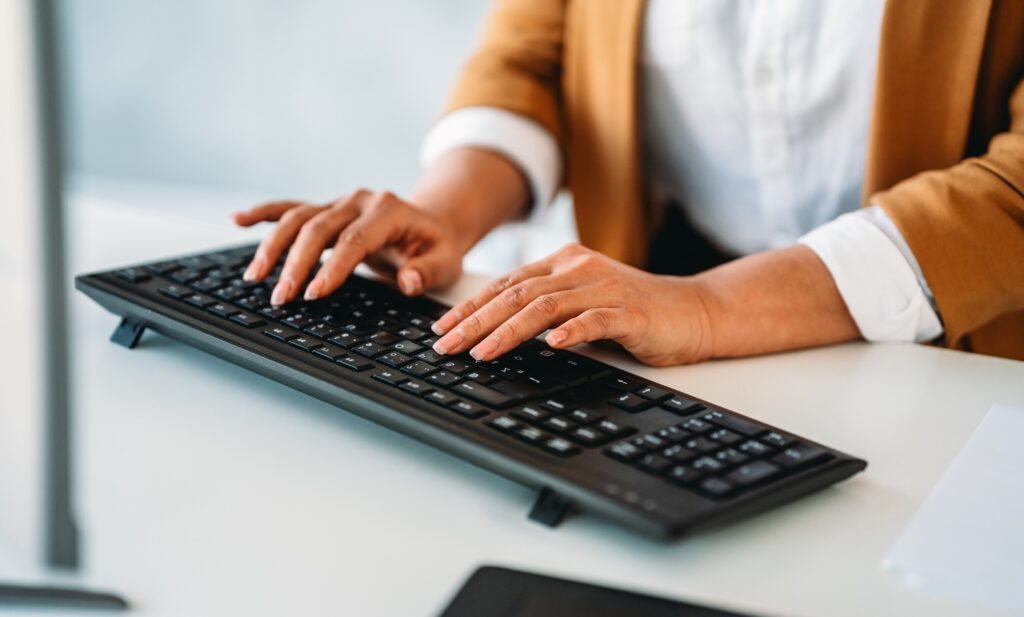 Analyst working with business analytics and data management system on computer. Business, finance