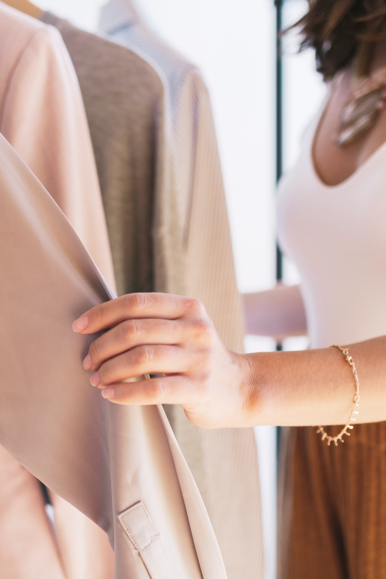 Fashion stylist working with clothes