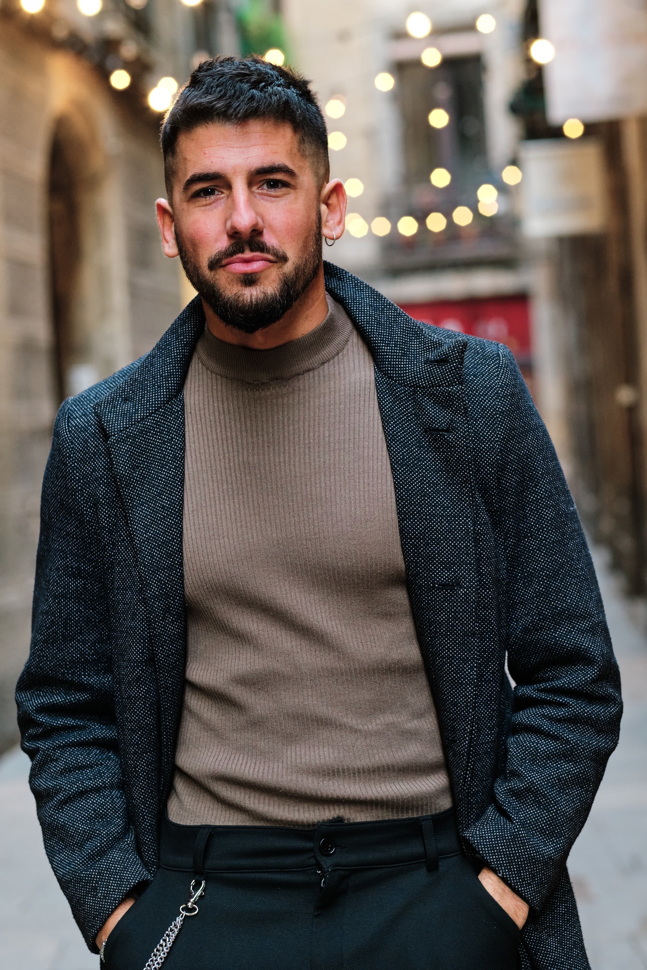 Vertical portrait of a handsome elegant man in the street